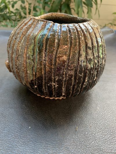 Australian handmade ceramic vase Flintstone designs